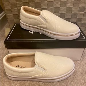 White slip on shoes